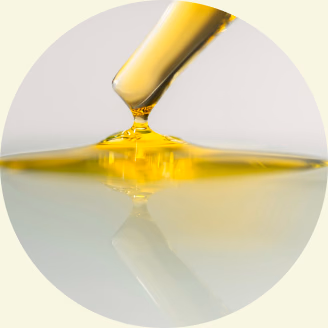 A drop of golden jojoba oil